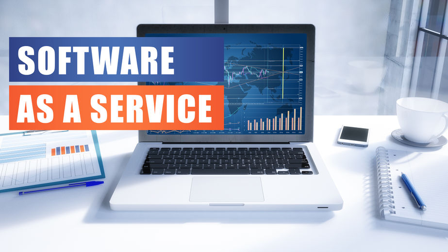 Software as a Service text on modern laptop screen in office environment. 3D render illustration business text concept.